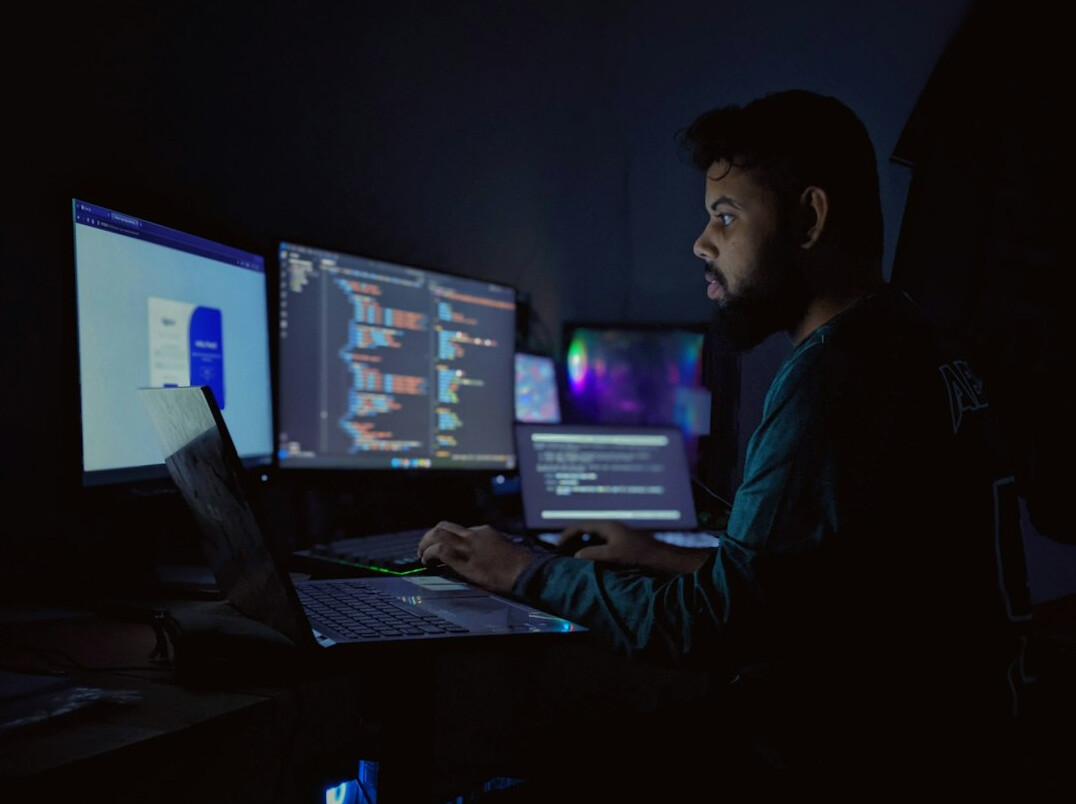 developers coding on computers
